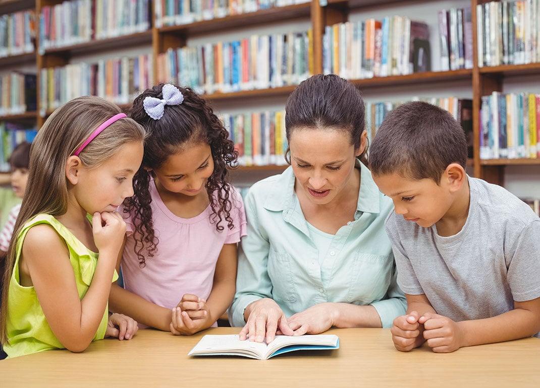 students-reading-book-with-teacher students-reading-book-with-teacher