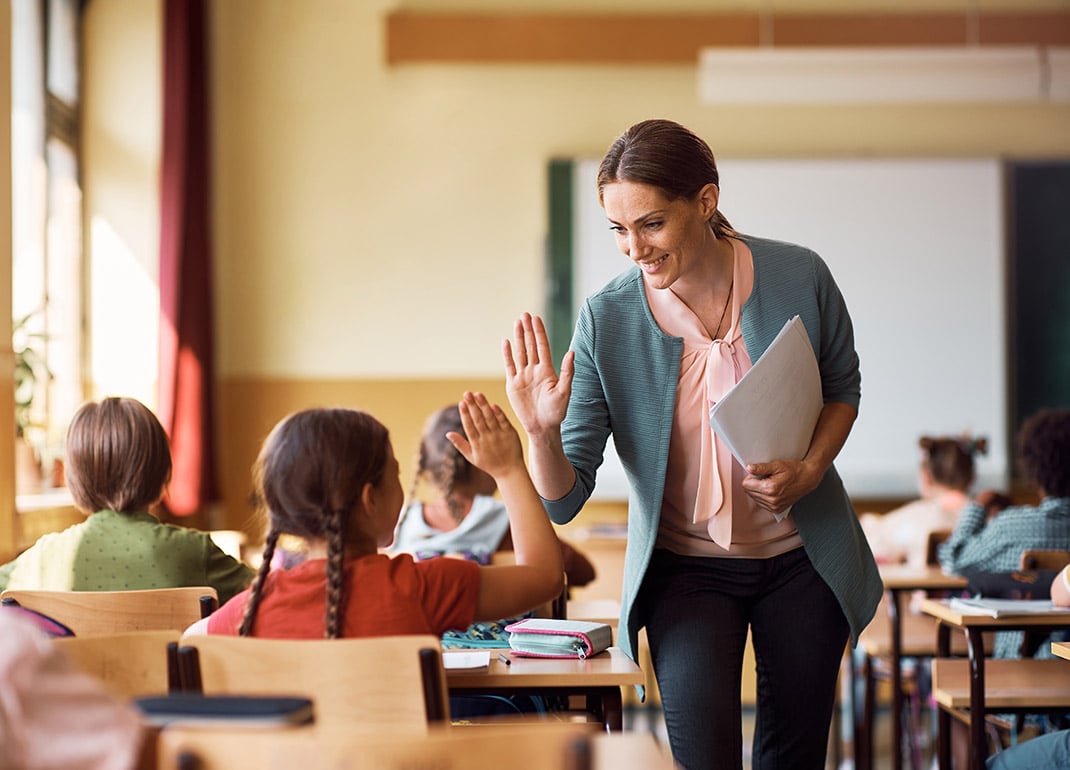 teacher-student-high-five teacher-student-high-five